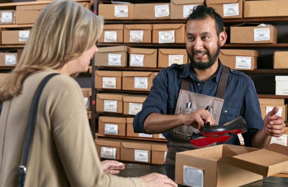 female-customer-buying-shoes-in-traditional-shoe-s-2025-04-03-17-03-31-utc-scaled-r5sp6224bqa38pqcbk53syrhp0k10lvsbv9qhcrtrk